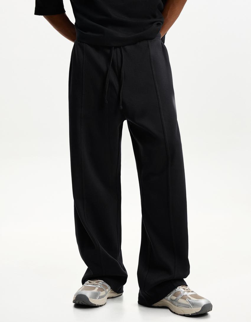 BERSHKA BAGGY TROUSERS IN BLACK