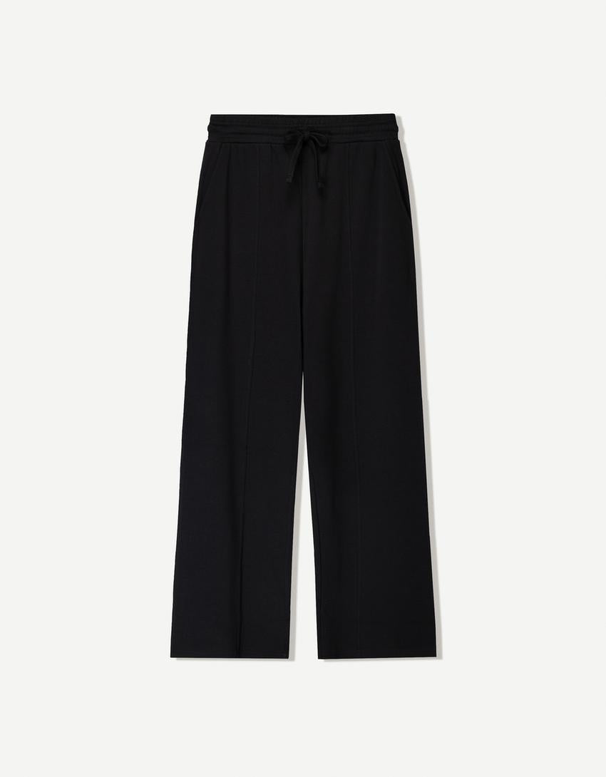 BERSHKA BAGGY TROUSERS IN BLACK